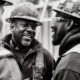 black-white-scene-showcasing-life-construction-workers-site